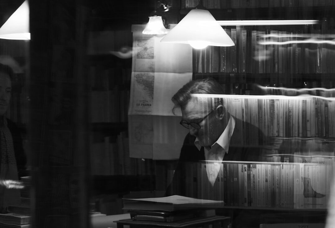detective examining old book