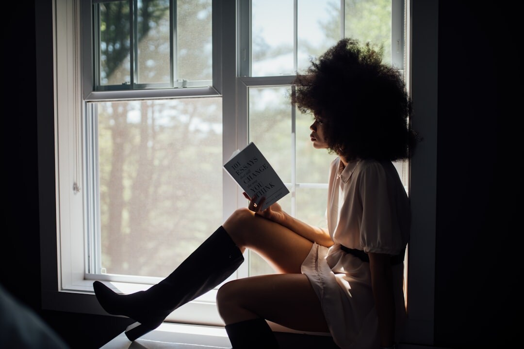 person reading mystery book